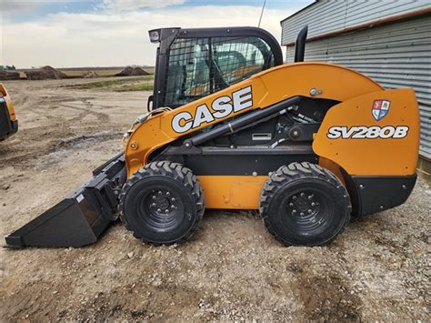 definition of a skid steer|types of skid steers.